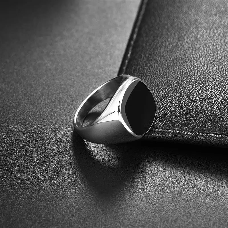 Anillo de sello negro con parte superior plana