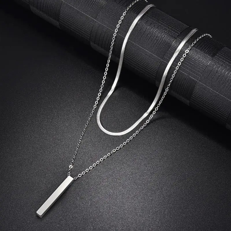 Collar con barra en V de doble capa